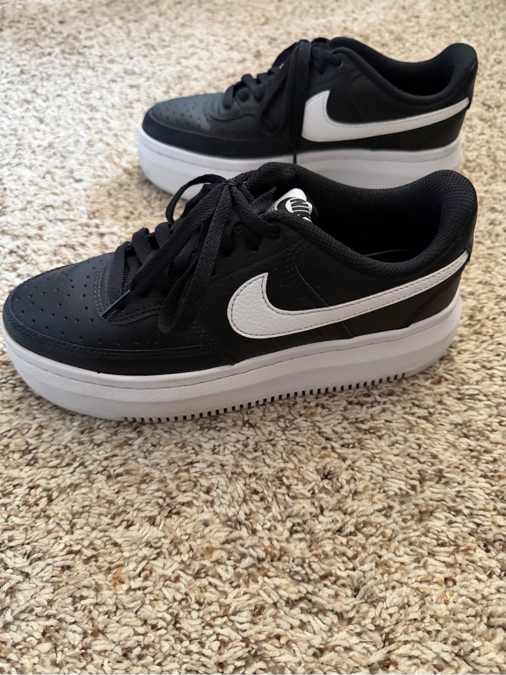 Nike Women’s Black and White Platform Sneakers